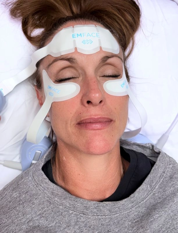 Patient receiving EMFACE facial treatment at a Las Vegas dental office to support facial muscle tone and skin rejuvenation.